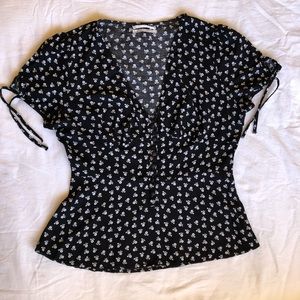 Black w/ white flowers rayon top empire waist sz S
